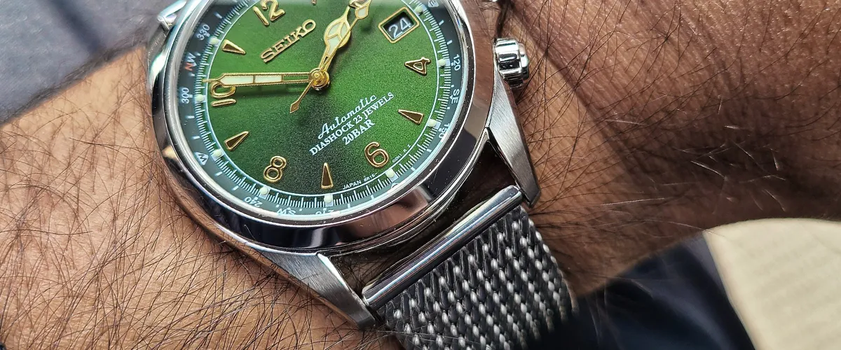 seiko alpinist stainless steel mesh strap with green dial